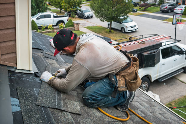 Professional Emergency Roof Repair technician working in Neelyton, PA